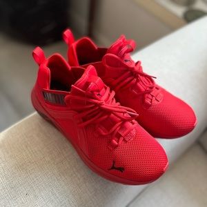 Red Puma athletic shoes